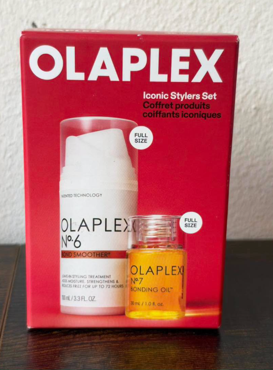 OLAPLEX „Iconic Stylers Set“ rinkinys su No.6 Bond Smoother ir No.7 Bonding Oil raudonoje dėžutėje